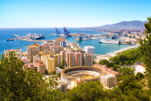 40793075 - view of malaga with bullring and harbor. spain